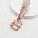 أداة تجميل ضرورية، 1قطعة من كمشة رموش ذات مقبض شفاف وردي مذهب