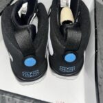 Air Jordan 9 Retro white/university blue-black Men’s size 10.5